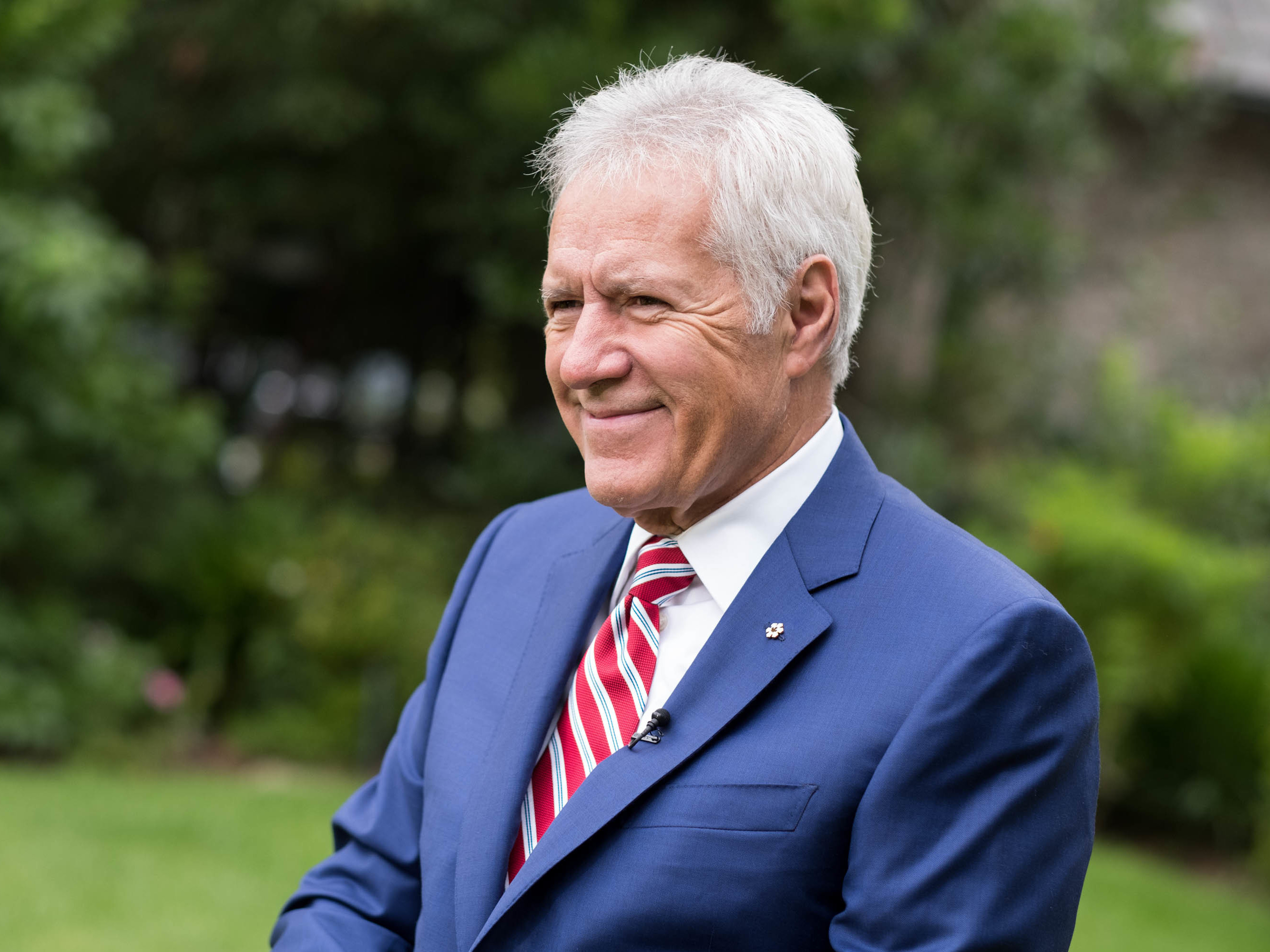 caption: Alex Trebek said in an interview with <em>People</em> magazine that his stage 4 pancreatic cancer is in "near remission."