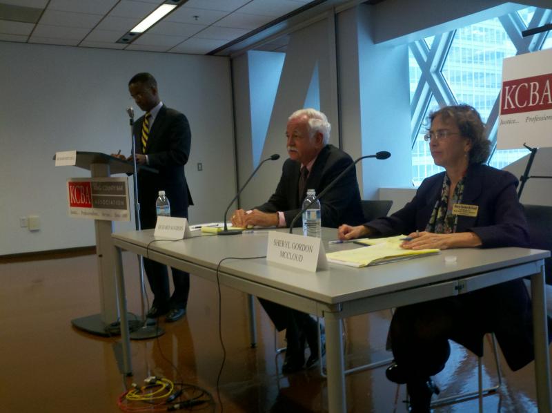 caption: Richard Sanders and Sheryl Gordon McCloud take questions from King County Bar Association president Richard Mitchell.