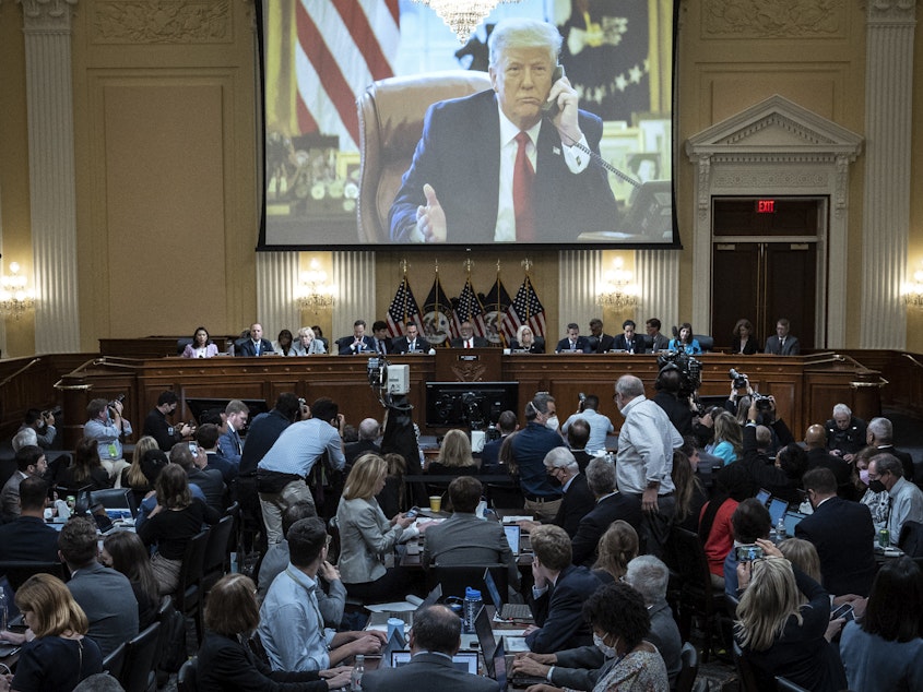 caption: An image of former President Trump is displayed during the third hearing of the House Jan. 6 committee Thursday.
