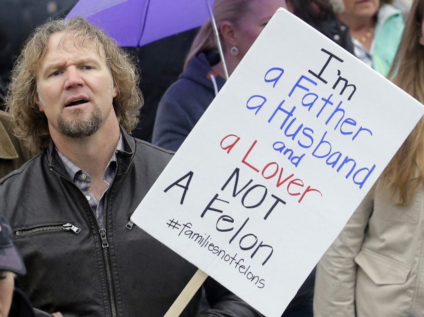 caption: Kody Brown, pictured in Feb. 2017, protested Utah's felony laws against polygamy. Brown and his three wives star in the TV show <em>Sister Wives. </em>