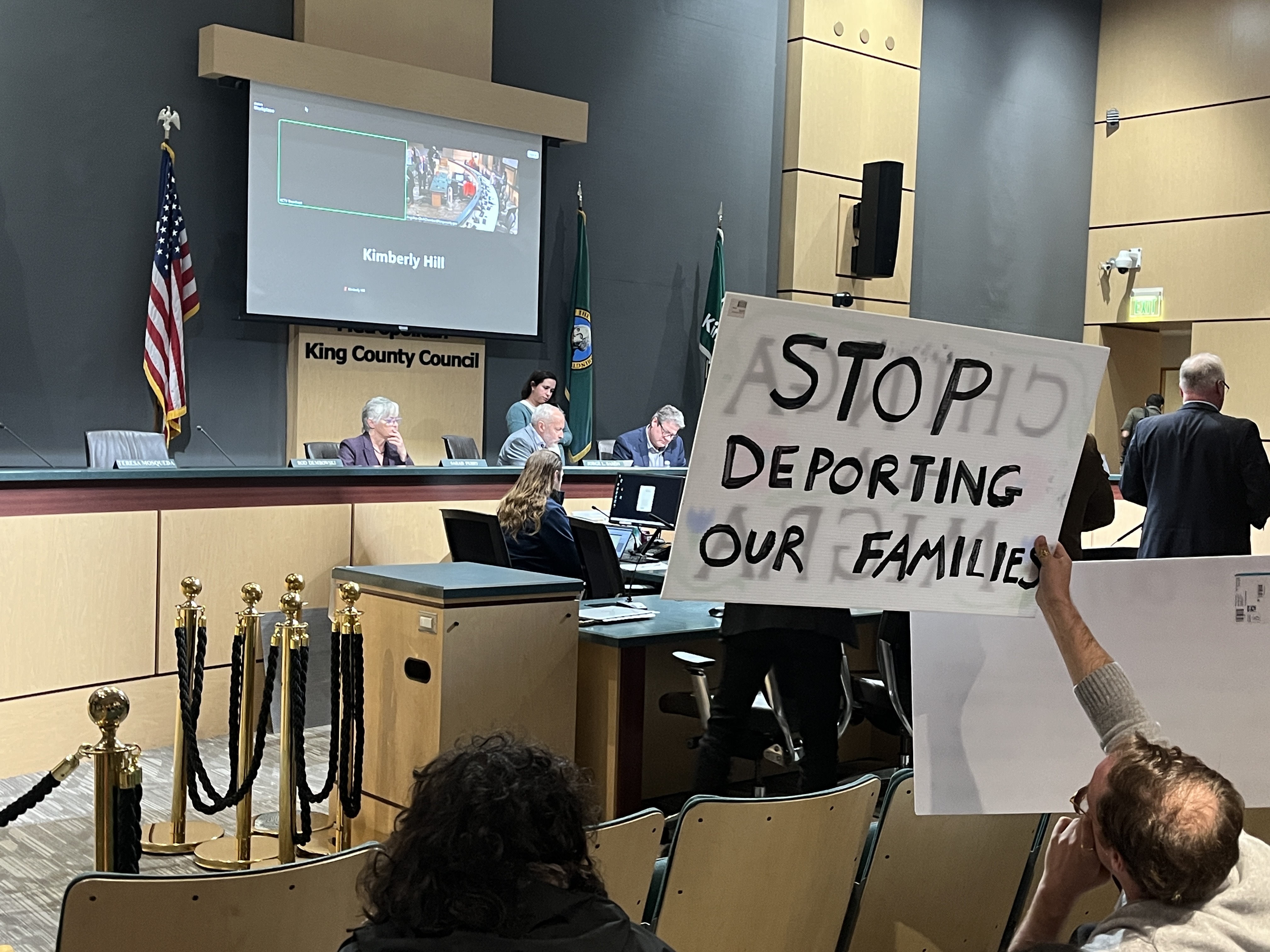 caption: Protesters attended the March 24 vote on the county's immigration enforcement staging ban. 

During the public comment section one public commuter went over their time shouting about how King County isn't doing enough, and ignoring this group. Soon after the council went virtual. 

The demonstrators want the county to pressure the governor’s office to stop the Washington Department of Licensing to stop sharing information with Customs and Border Patrol.