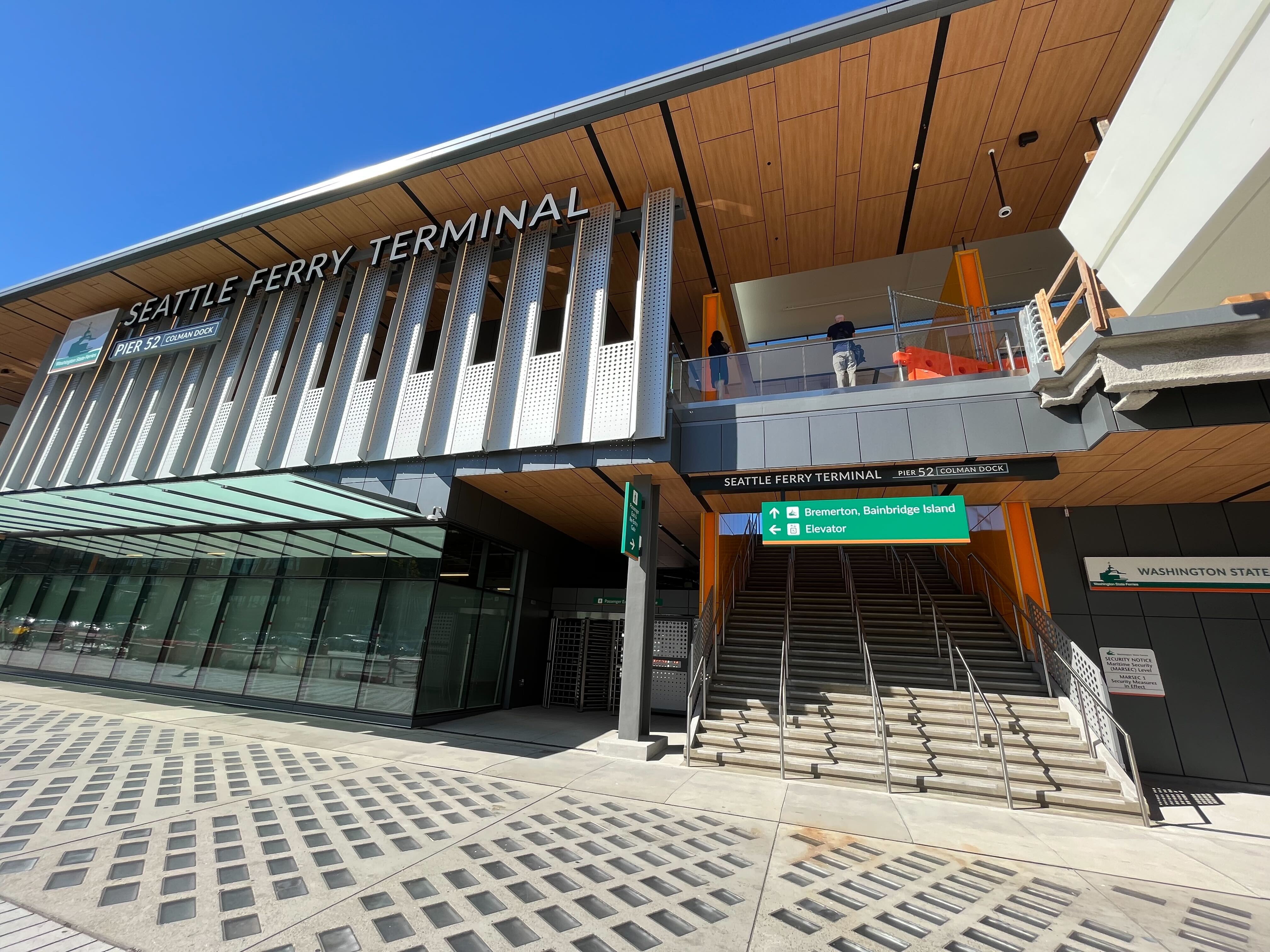 caption: A remodeled and upgraded Colman Dock opened to ferry riders on the Seattle waterfront, Friday, Aug. 4, 2023. 