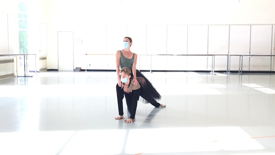caption: PNB soloists Elle Macy and Dylan Wald in the studio. The couple are among the few dancers allowed to touch one another because they are offstage domestic partners