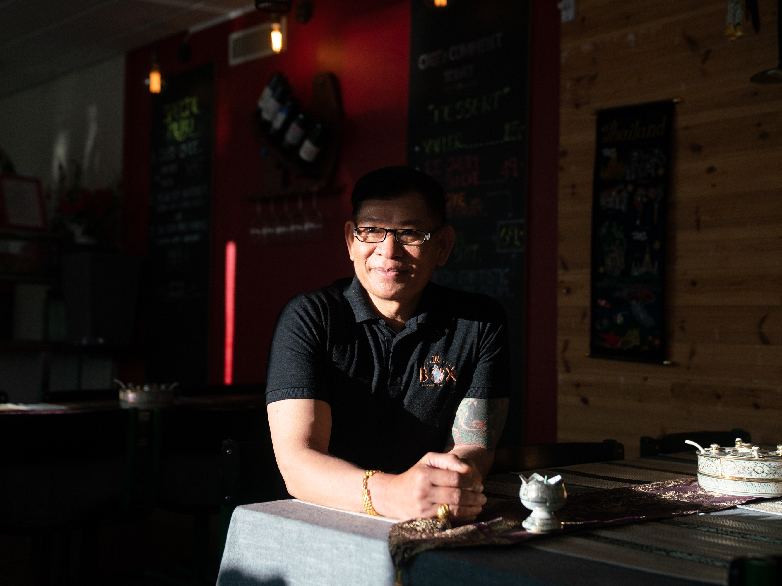 caption: Suriya Paprajong moved to Greenland in the winter of 2001. Some 18 years later, he has built up a life, including opening his own restaurant.