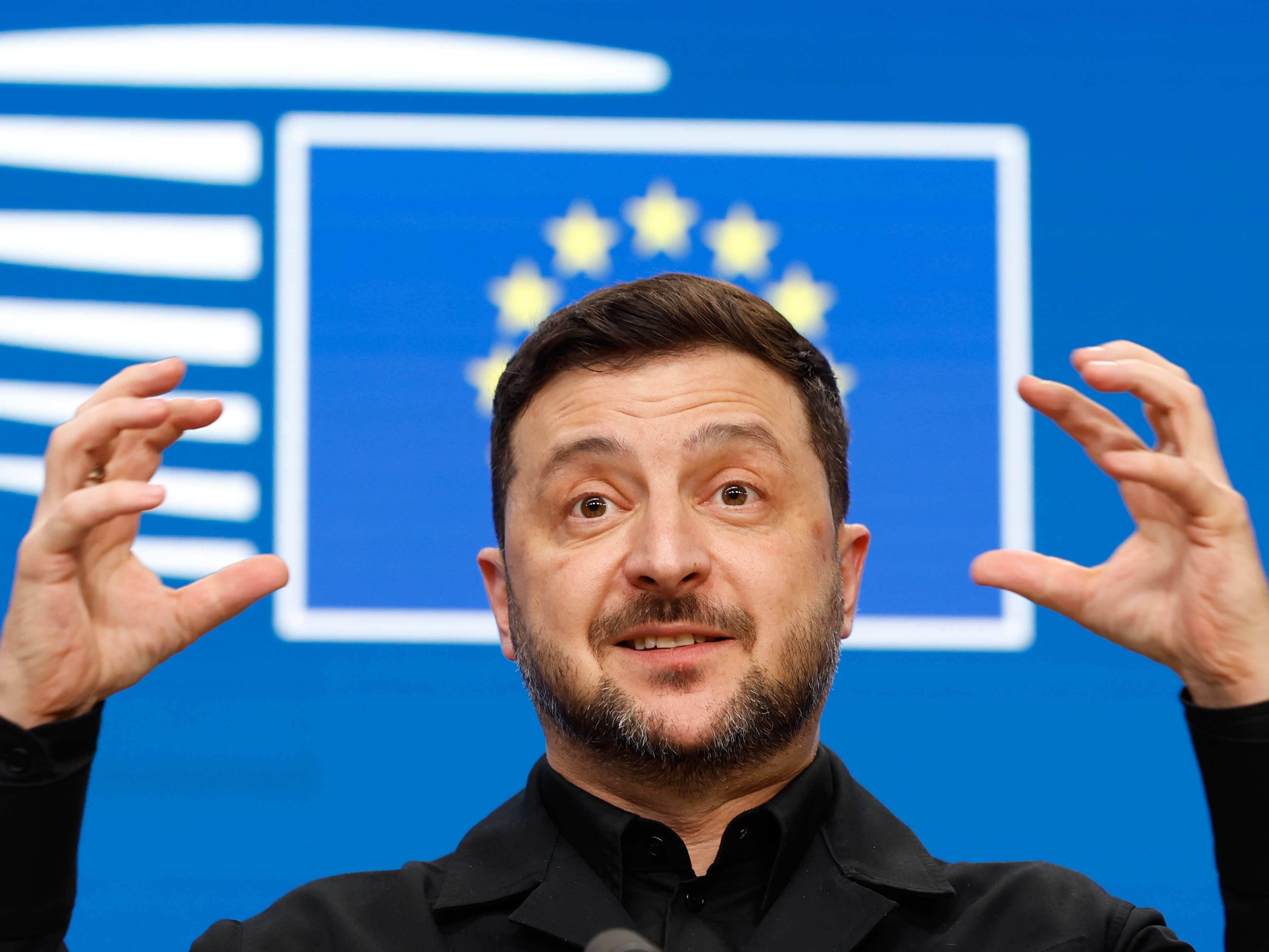 caption: Ukraine's President Volodymyr Zelenskyy speaks during a media conference at the EU Summit in Brussels, Thursday, Dec. 18, 2025.