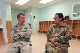 caption: Lt. Col. Eric Flake, a physician at Madigan Army Medical Center in Tacoma, Wa. in what will be a new autism therapy center with Major Ruth Racine, a nurse practitioner who has a child with autism.