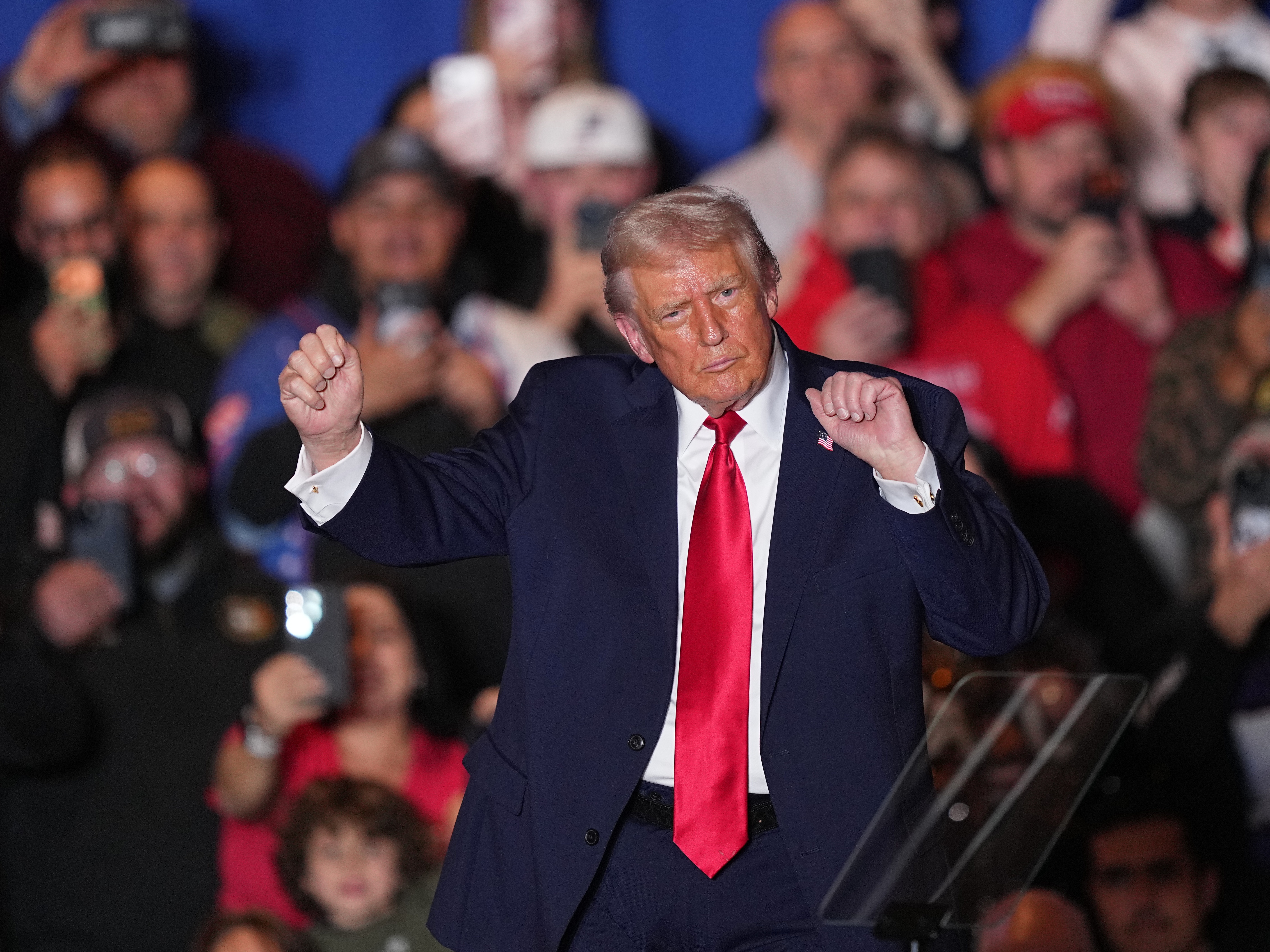 caption: President Donald Trump dances to music after speaking at the Mount Airy Casino Resort in Mount Pocono, Pa., Tuesday, Dec. 9, 2025.