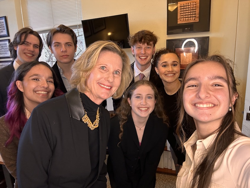 caption: Washington state Sen. Patty Kuderer (D-Bellevue) poses with Lake Washington High School AP Government students. The students brought Kuderer legislation to put Narcan in all Washington schools.