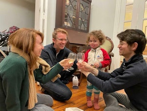 caption: Rhaina Cohen and her husband live in a row house with another couple and their two children in Washington, D.C. Cohen says they wanted to share a home with people who they were excited to live with — and who they could depend on. From left to right: Cohen, her husband, her housemate's child and her housemate.