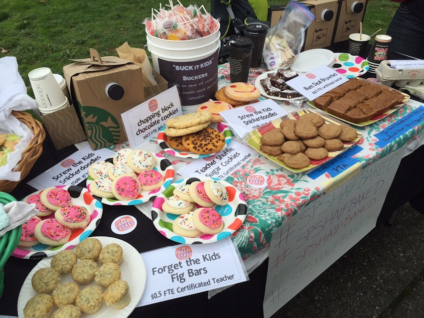 caption: With prices starting at $5,000 for a brownie, this bake sale was meant to raise awareness more than money.