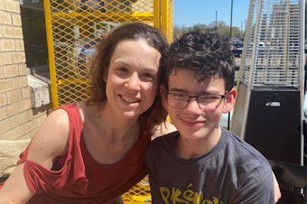caption:  Robin Marie and her 13-year-old son Brennan pose for a photo earlier this spring at a restaurant in Texas. Marie was visiting her son who's living and attending school at an out-of-state residential treatment facility paid for by his local school district and the state. 