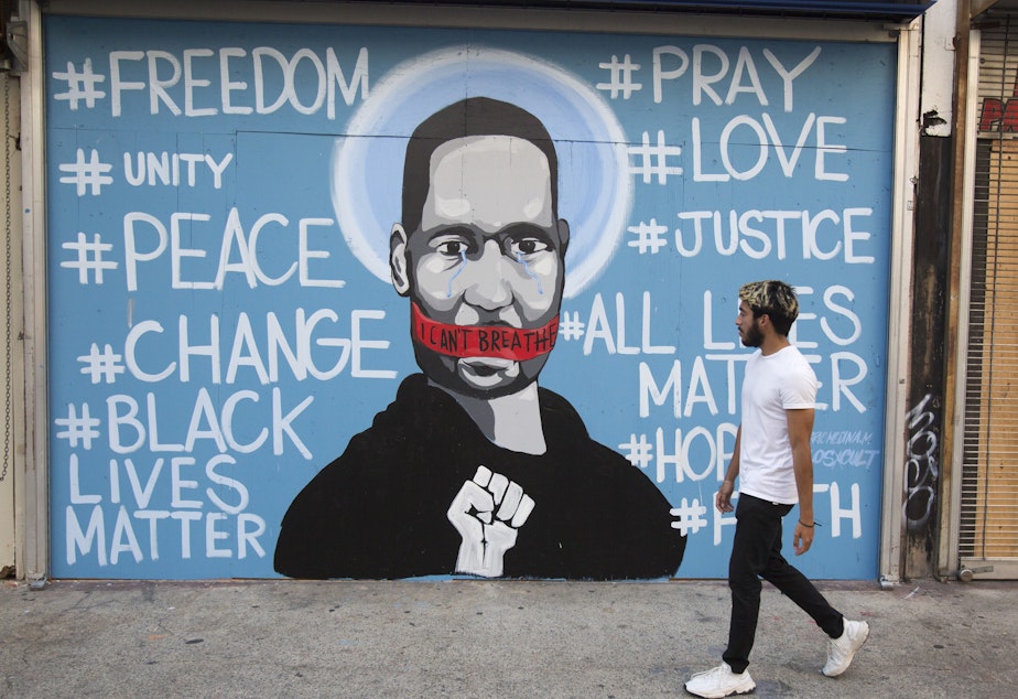 caption: A mural in Los Angeles depicts George Floyd.