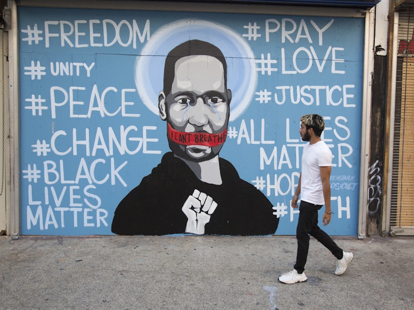 caption: A mural in Los Angeles depicts George Floyd.