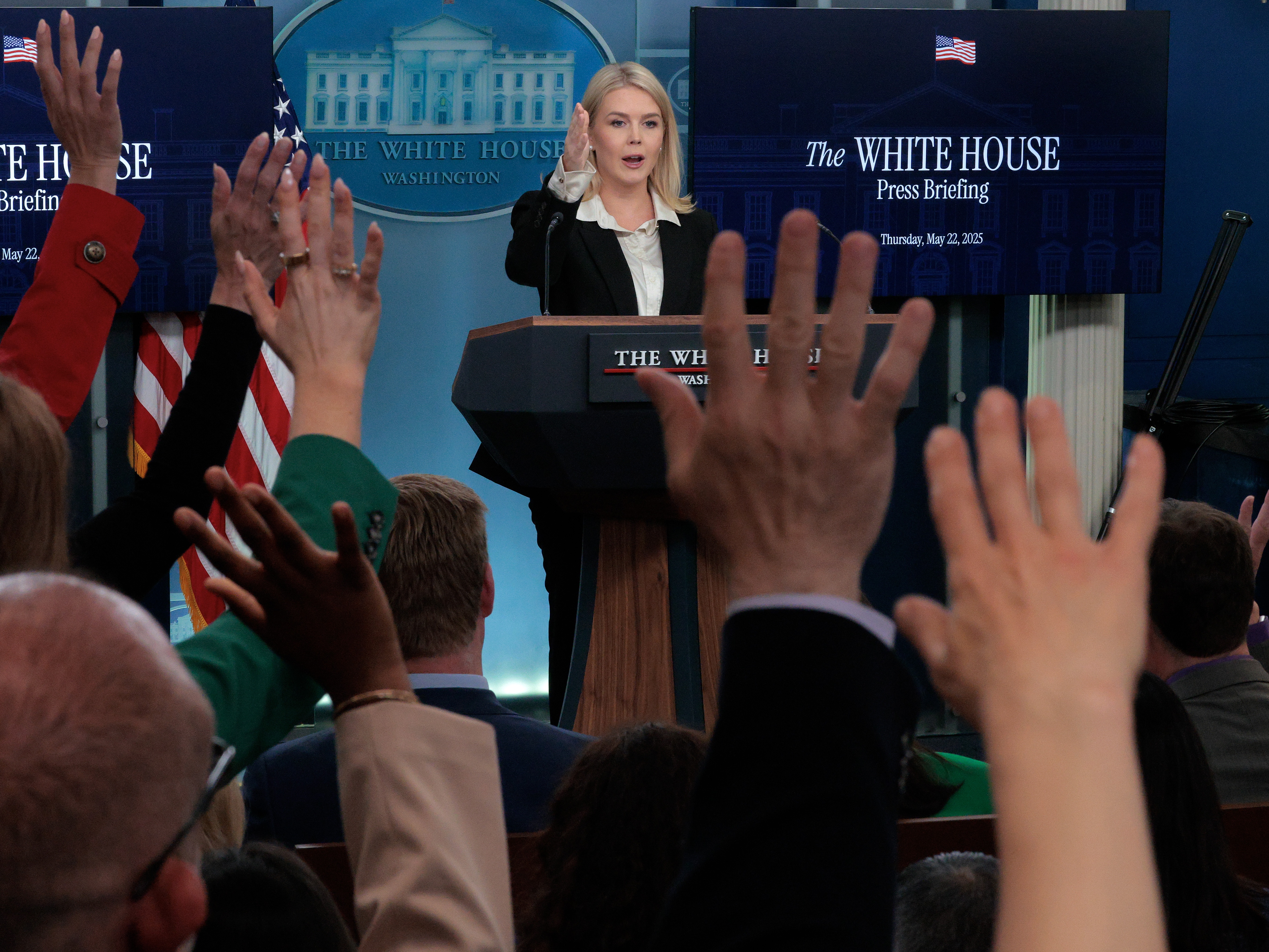 caption: White House Press Secretary Karoline Leavitt talks to reporters in the Brady Press Briefing Room at the White House on May 22, 2025 in Washington, DC.