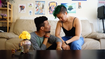 caption: Liz Cartojano and James Riley Mose from a dance film that they produced for the #AZNxBLM project. 