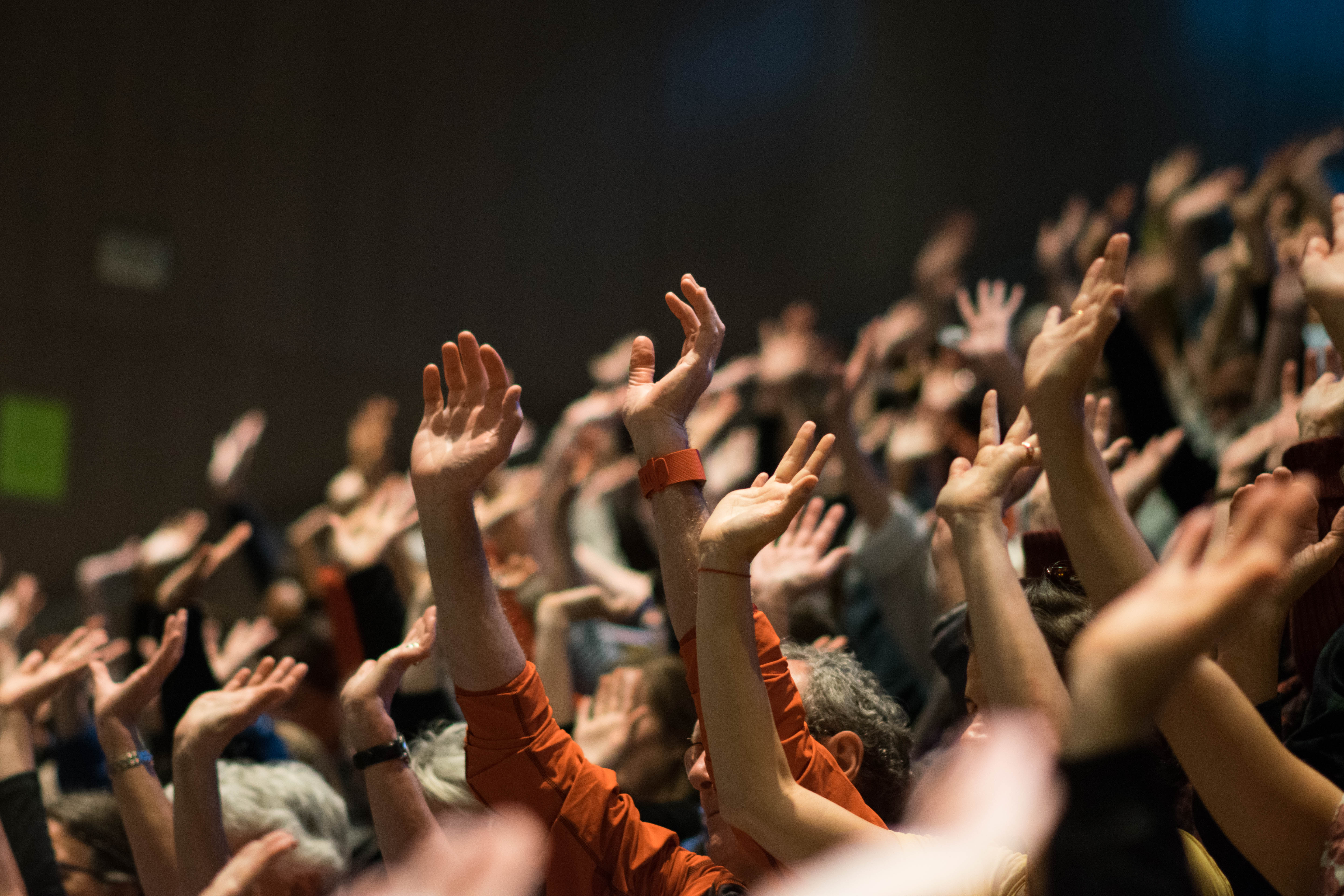 caption: Holding up the sky' at Seattle Public Library on PechaKucha Night