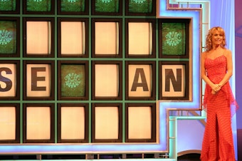 caption: Vanna White has been a presenter on Wheel of Fortune for nearly 40 years.