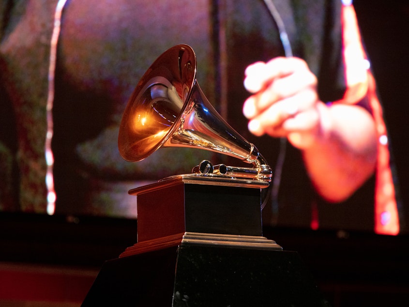 caption: A view of a Grammy statue during a performance at the Chicago Chapter 60th Anniversary Concert at Millennium Park on Sept. 16, 2021 in Chicago.
