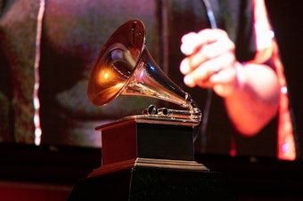 caption: A view of a Grammy statue during a performance at the Chicago Chapter 60th Anniversary Concert at Millennium Park on Sept. 16, 2021 in Chicago.