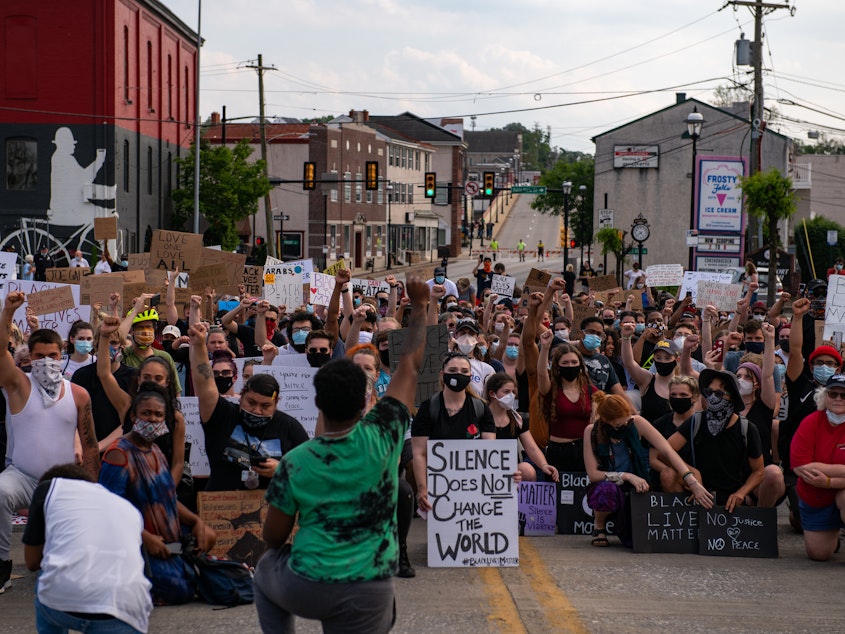 caption: Protestors against police violence gather in Bridgeport, Pa., as they prepare to march across a bridge to neighboring Norristown, Pa. on June 3.