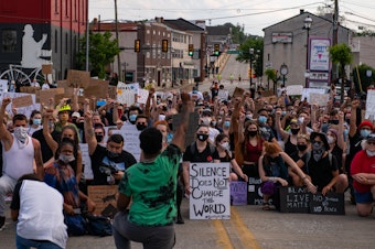 caption: Protestors against police violence gather in Bridgeport, Pa., as they prepare to march across a bridge to neighboring Norristown, Pa. on June 3.