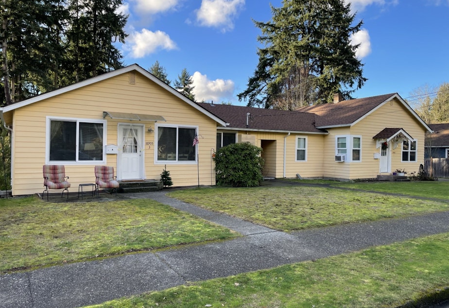 caption: On this property in Bothell's Lower Maywood Hills, a four-plex. Two units face the street, and two are accessed from a small parking area in back.