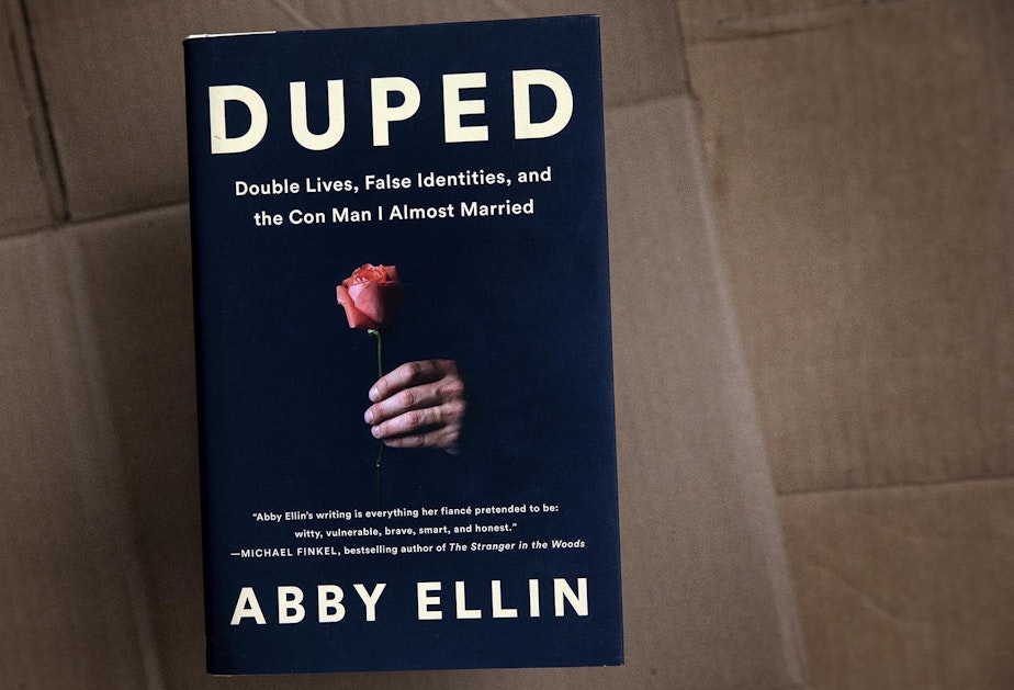 caption: "Duped: Double Lives, False Identities, and the Con Man I Almost Married," by Abby Ellin. (Robin Lubbock/WBUR)