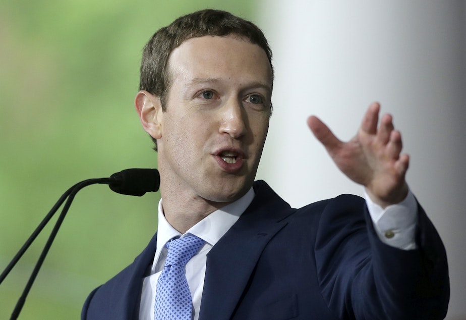 caption: FILE - In this May 25, 2017, file photo, Facebook CEO Mark Zuckerberg delivers the commencement address at Harvard University in Cambridge, Mass. 