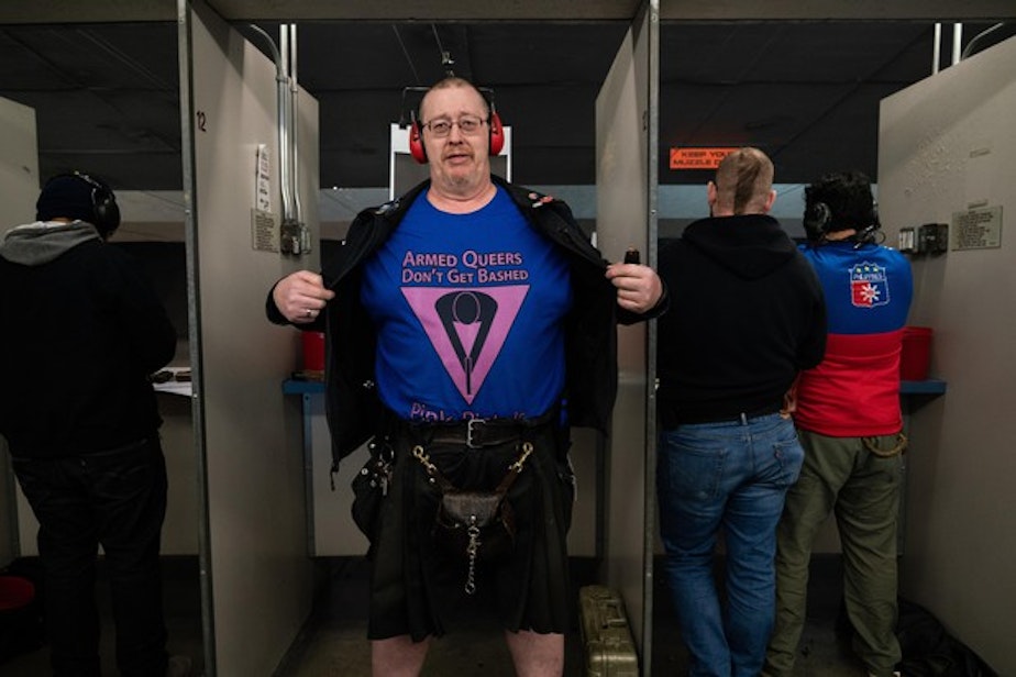 caption: <p>L.A. Watson-Haley shows off his new T-shirt at The Liberal Gun Club’s winter range day on Jan. 26, 2019 in Portland, Ore.</p>