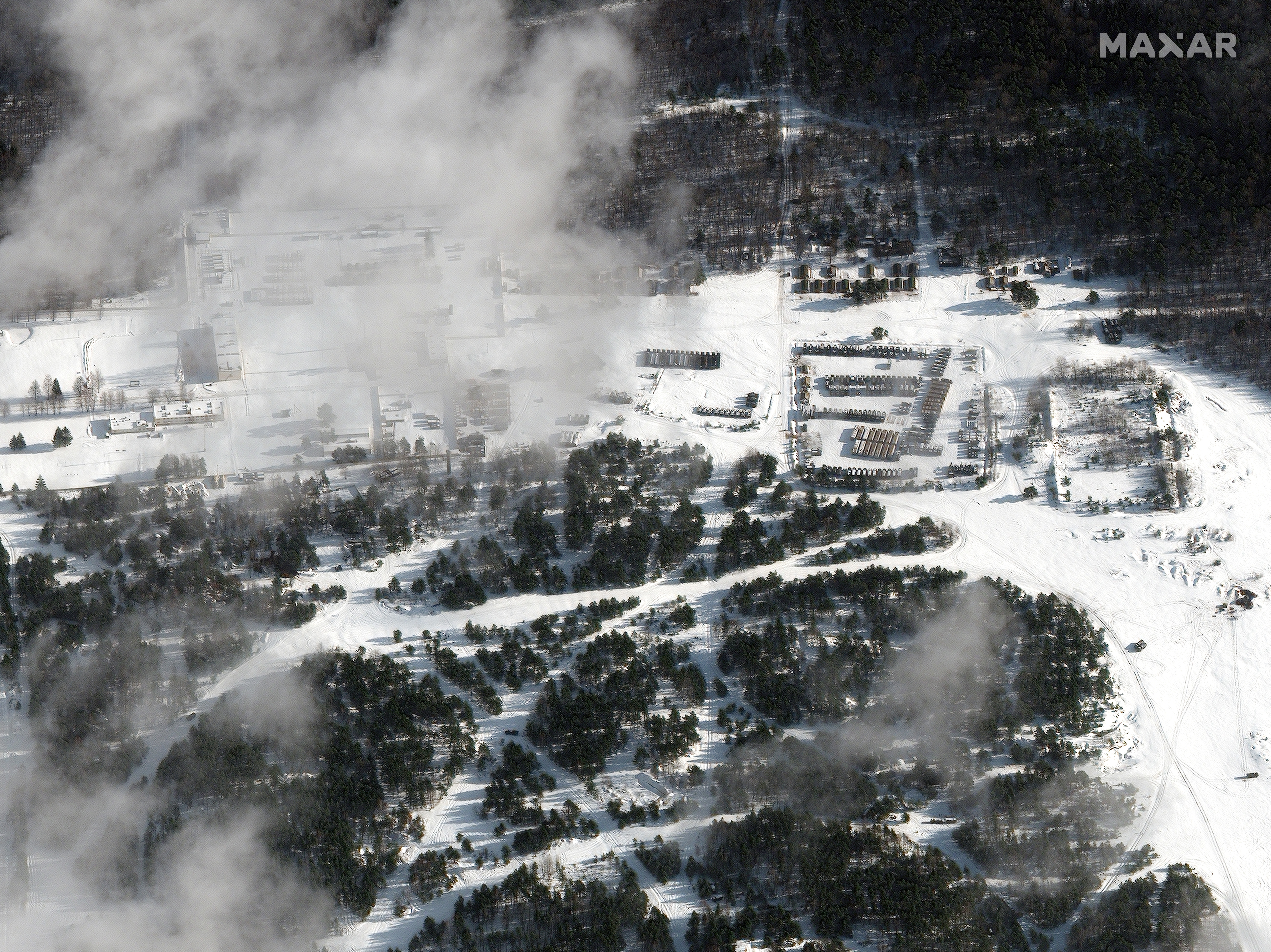 caption: A satellite image shows Russian military buildup at the Osipovichi training area in Belarus.