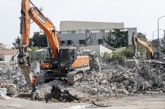 caption: A police station razed by Israeli forces<strong> </strong>after being occupied by Hamas militants in Sderot, Israel.