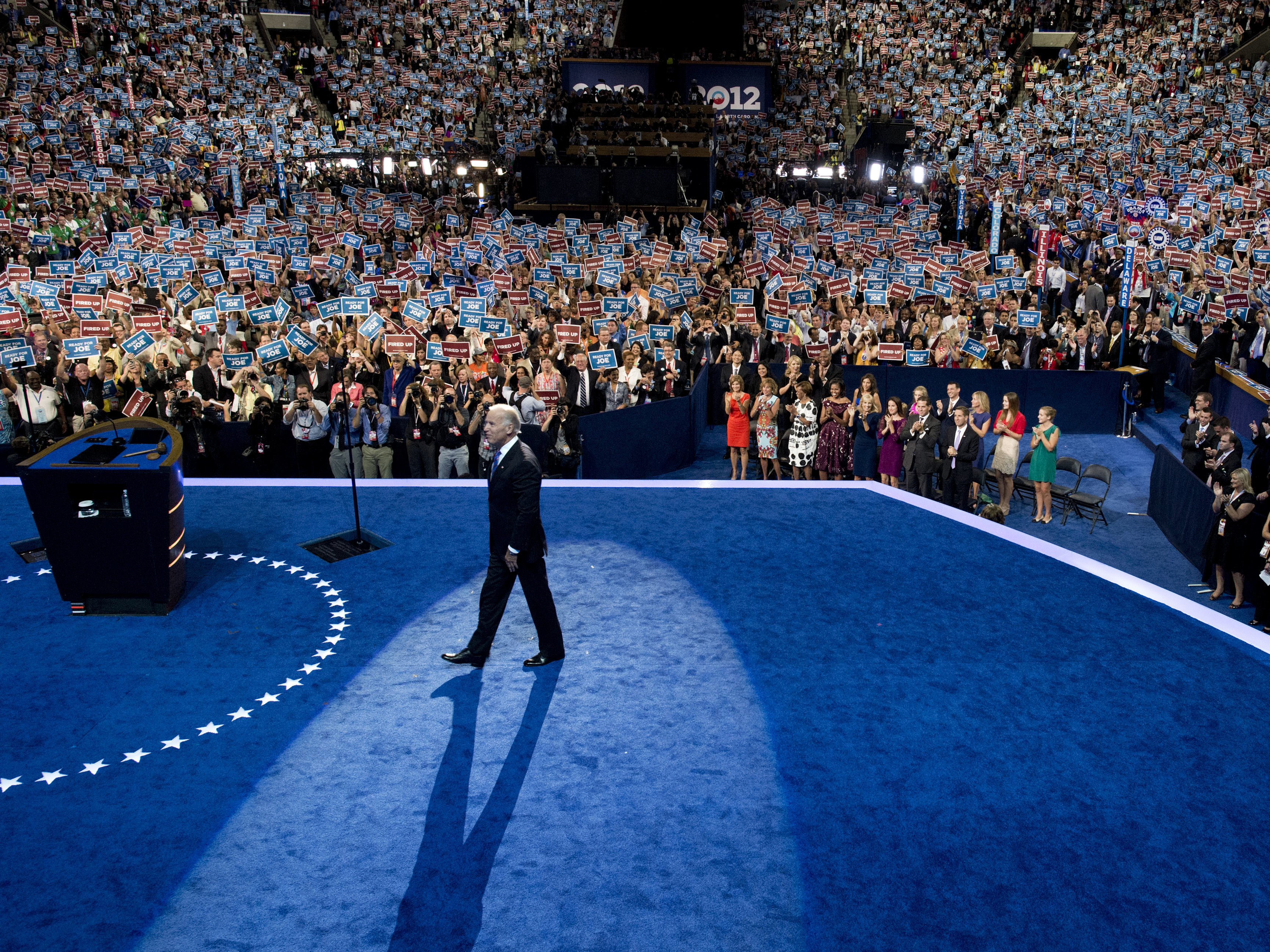 caption: Then-Vice President Joe Biden takes the stage at the Democratic National Convention in 2012. He said it's "hard to envision" a similar scene this year.