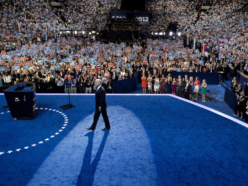 caption: Then-Vice President Joe Biden takes the stage at the Democratic National Convention in 2012. He said it's "hard to envision" a similar scene this year.