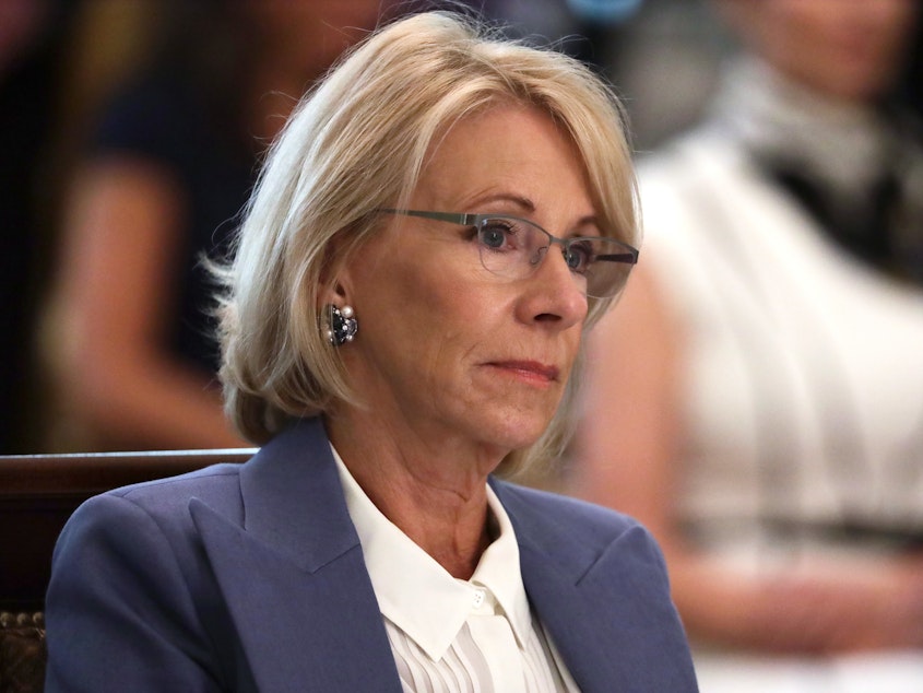 caption: In April, U.S. Education Secretary Betsy DeVos issued guidance suggesting private schools should benefit from a representative share of federal coronavirus aid money.
