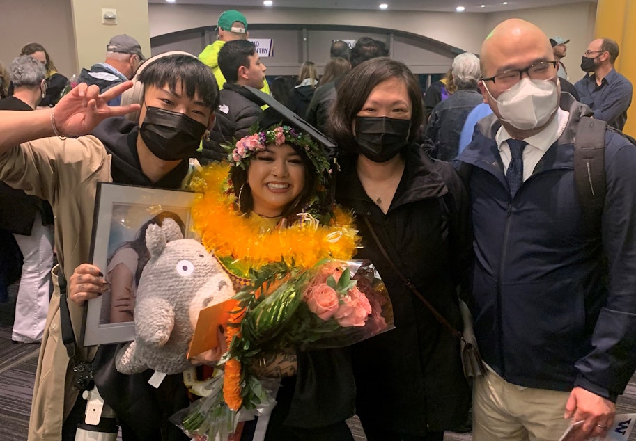 caption: April Reyes (second from left) with her family at her college graduation. From left to right: Tamar Manuel, April Reyes, Tanya Kim, and Alan Lee.
