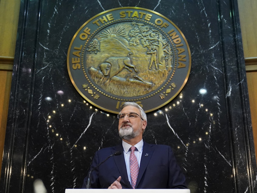 caption: Indiana Gov. Eric Holcomb delivers his State of the State address to a joint session of the legislature at the Statehouse, Tuesday, Jan. 11, 2022, in Indianapolis.