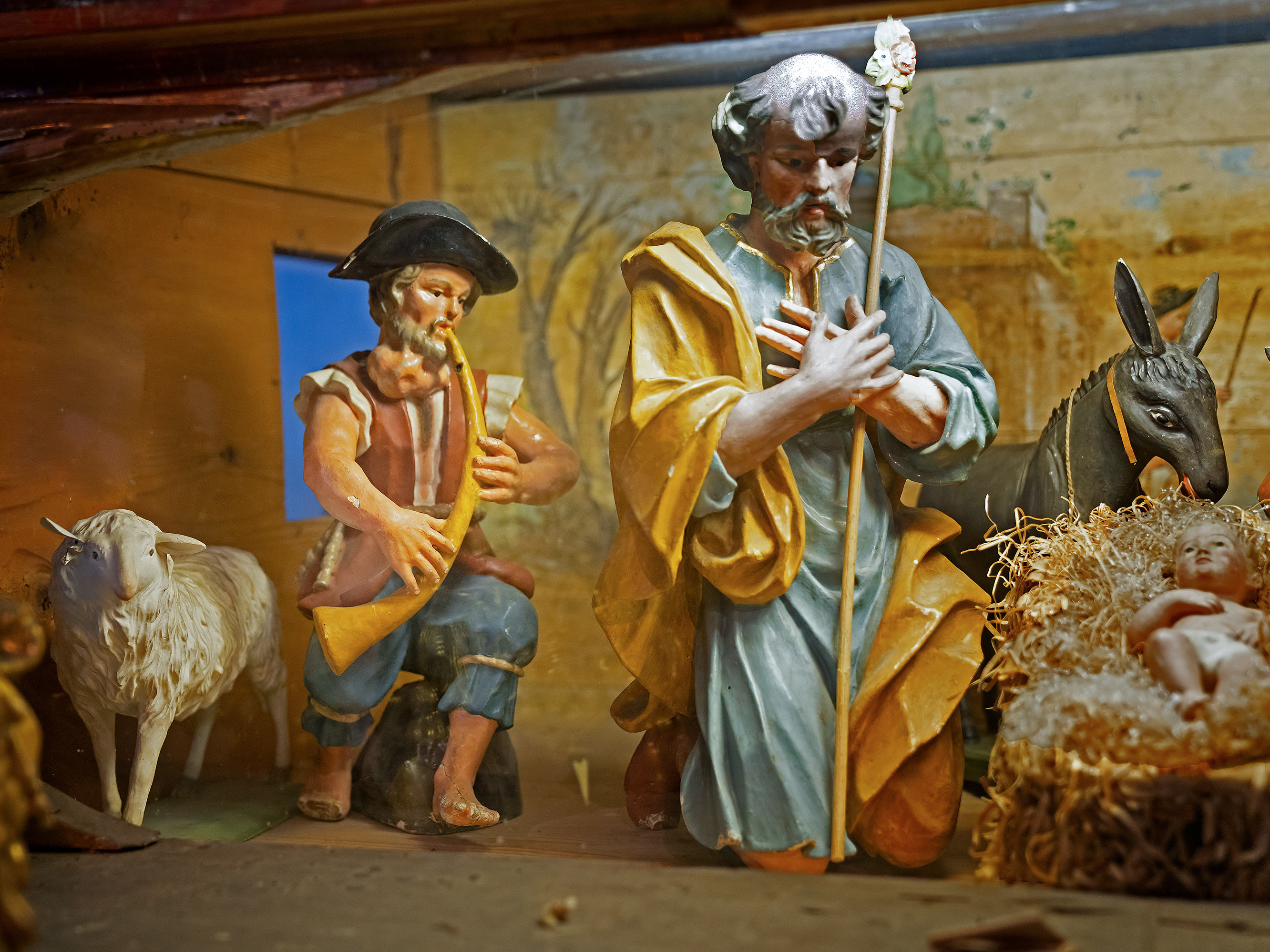 caption: A horn player (left) in this detail from a 1694 altar carving by Francesco Antonio d'Alberto in Piedmont, Italy, clearly has a swollen neck that signifies goiter, medical historians say. The thyroid condition was a sign of poverty in those days.