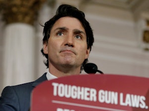 caption: Canada's Prime Minister Justin Trudeau announces new gun control legislation in Ottawa, Ontario, on Monday.