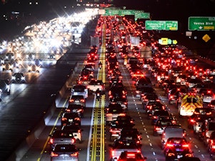 caption: The 405 Freeway during rush hour traffic on March 10, in Los Angeles. Americans' greatest contribution to global greenhouse gas emissions comes from transportation, mostly from cars and trucks, according to the federal government.