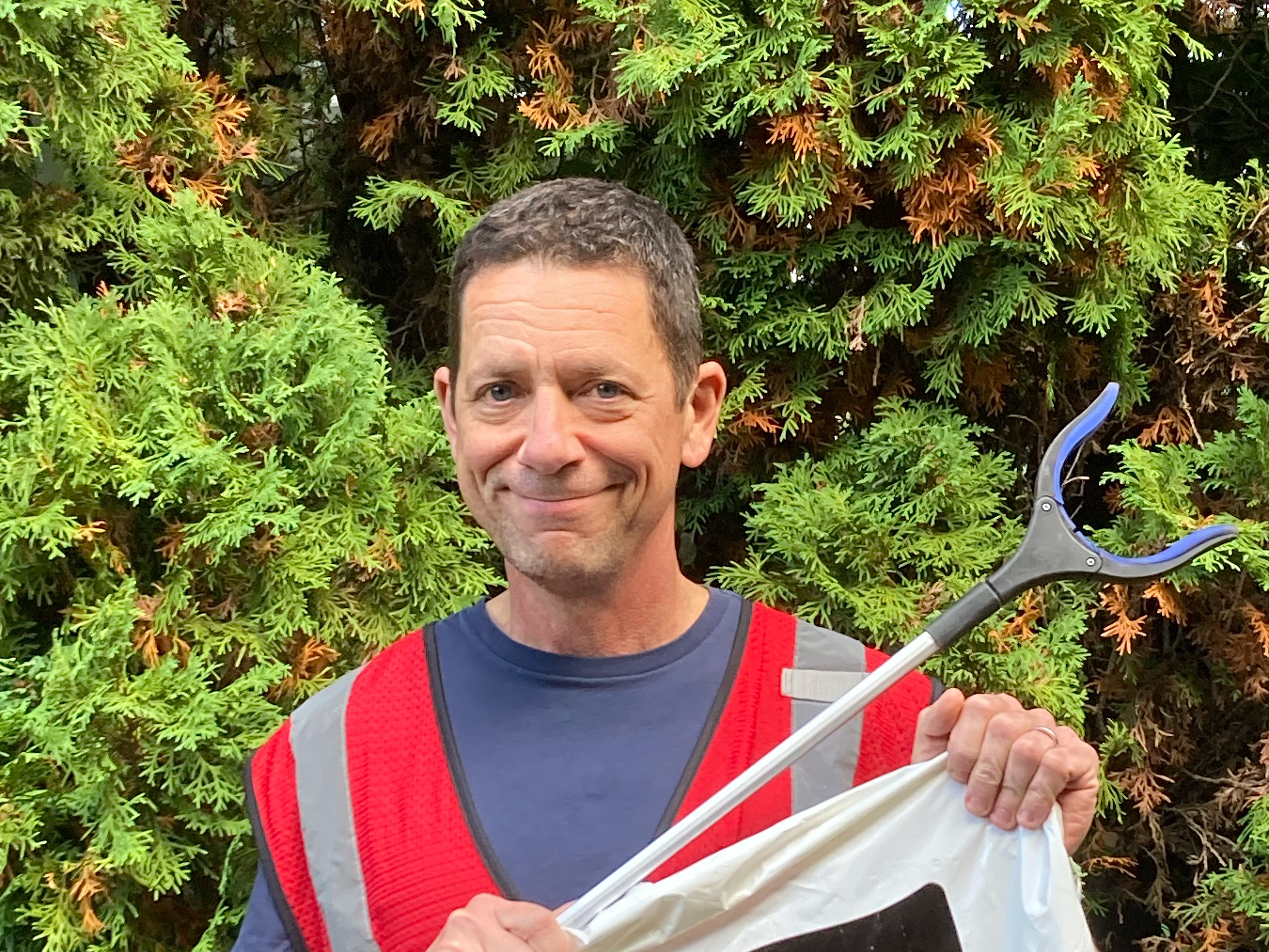 caption: Mark Remy started volunteering with SOLVE, a non-profit based in Portland, Ore. about three years ago.