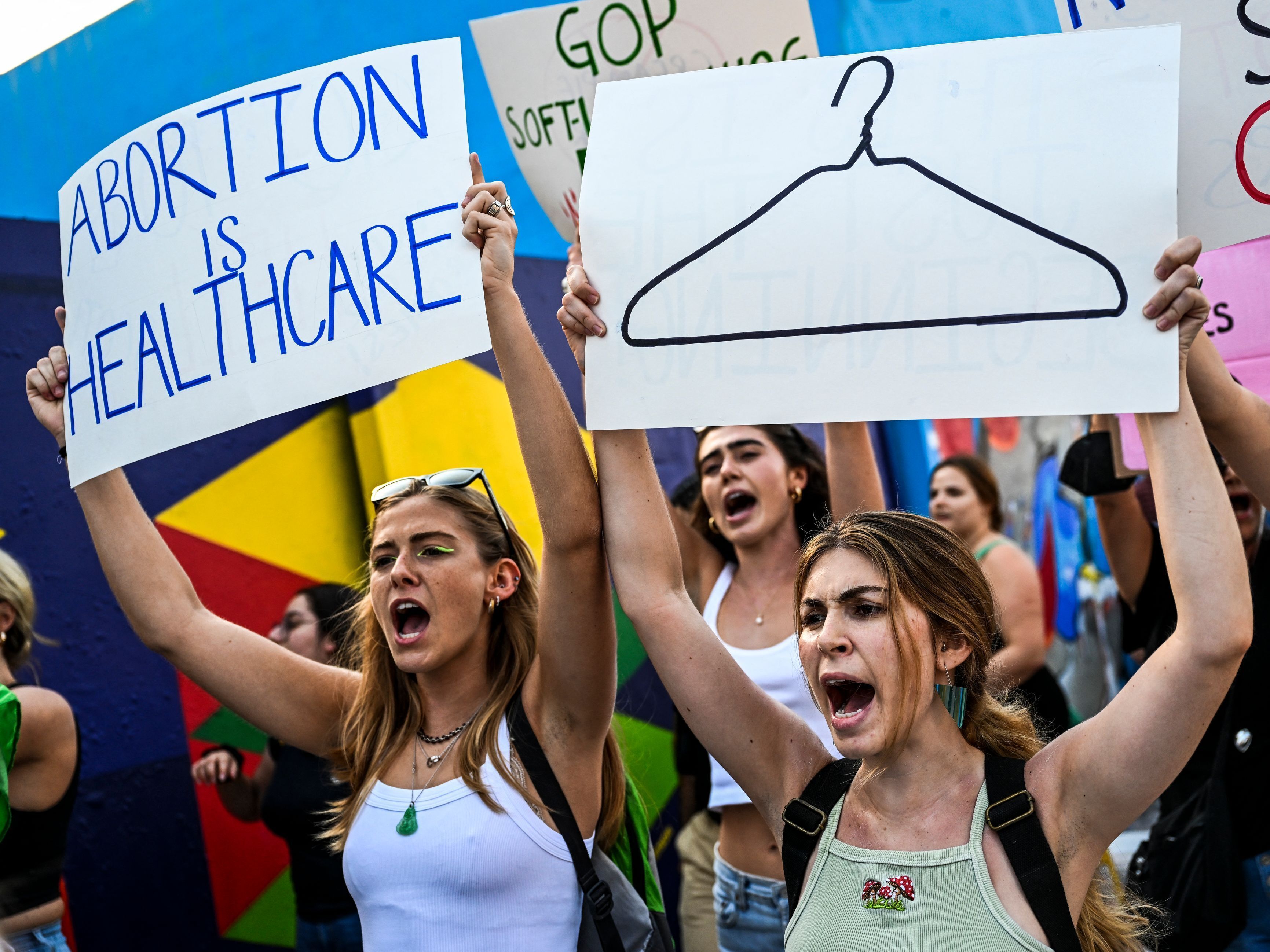 caption: In the wake of the overturning of <em>Roe v. Wade</em> last Friday, abortion-rights activists continue to fight against laws restricting access to abortion.