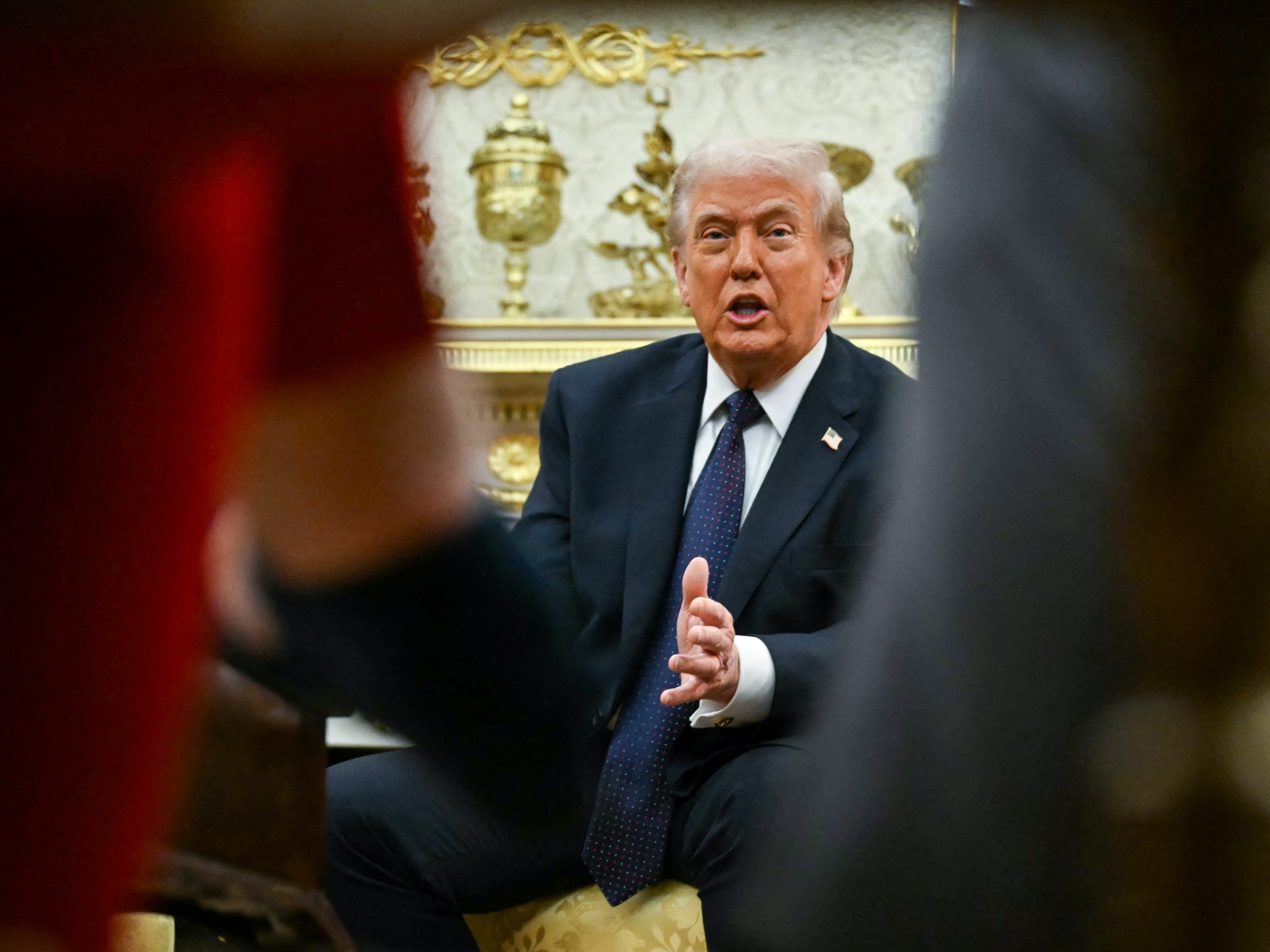 caption: President Trump speaks during a meeting with German Chancellor Friedrich Merz in the Oval Office on March 3. Chancellor Merz is the first European leader to visit Trump since the United States and Israel launched their war against Iran.