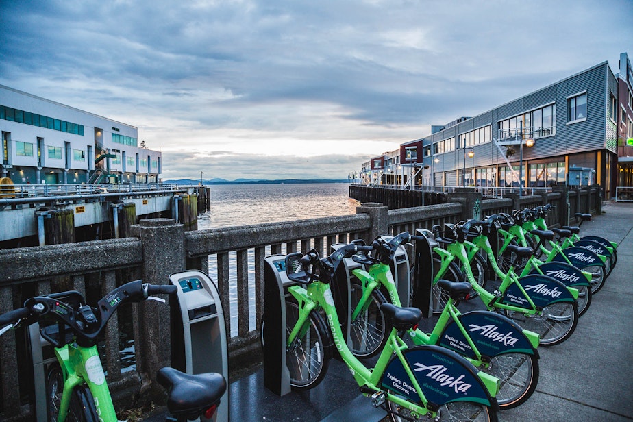 caption: Pronto bikes on the Seattle waterfront. The City of Seattle voted to buy the nonprofit, even though it wasn't doing well financially.