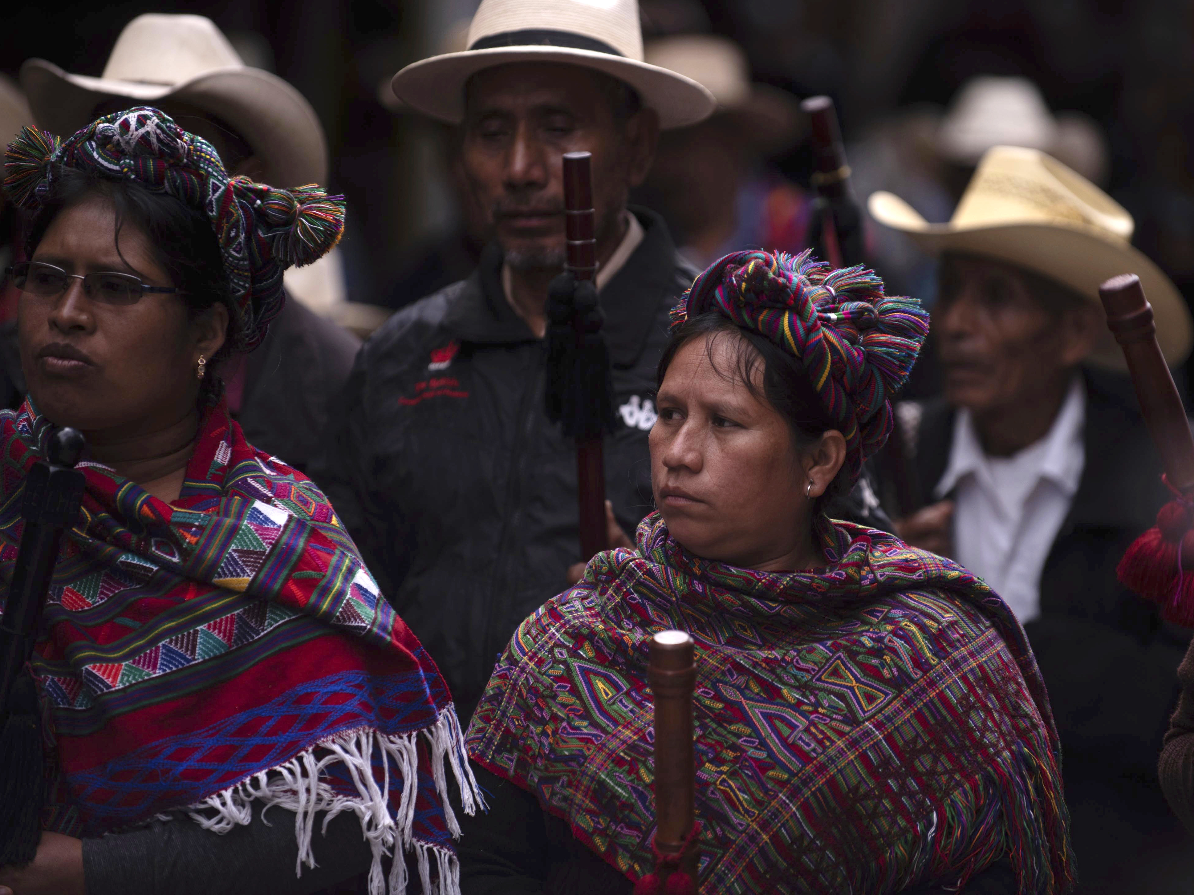caption: Mayan indigenous people protest against the government of Guatemalan President Jimmy Morales on the day he gives an address to Congress in Guatemala City, Monday.