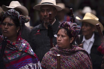 caption: Mayan indigenous people protest against the government of Guatemalan President Jimmy Morales on the day he gives an address to Congress in Guatemala City, Monday.