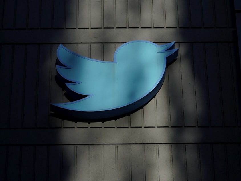 caption: A sign at Twitter headquarters is shown in San Francisco, Friday, Nov. 18, 2022. Elon Musk's Twitter has dissolved its Trust and Safety Council, the advisory group of nearly 100 independent civil, human rights and other organizations that the company formed in 2016 to address hate speech, child exploitation, suicide, self-harm and other problems on the platform.