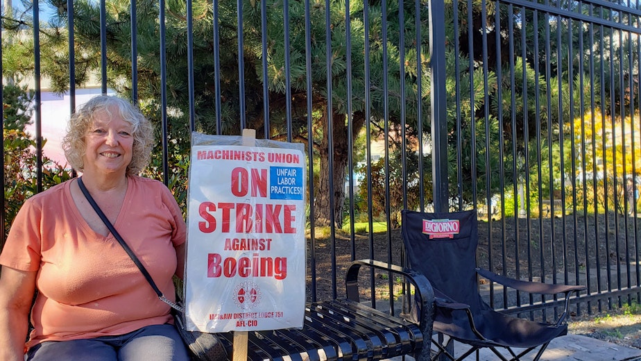 caption: Lori Coleman on strike outside the Boeing Renton plant on Tuesday, Sept. 24, 2024.