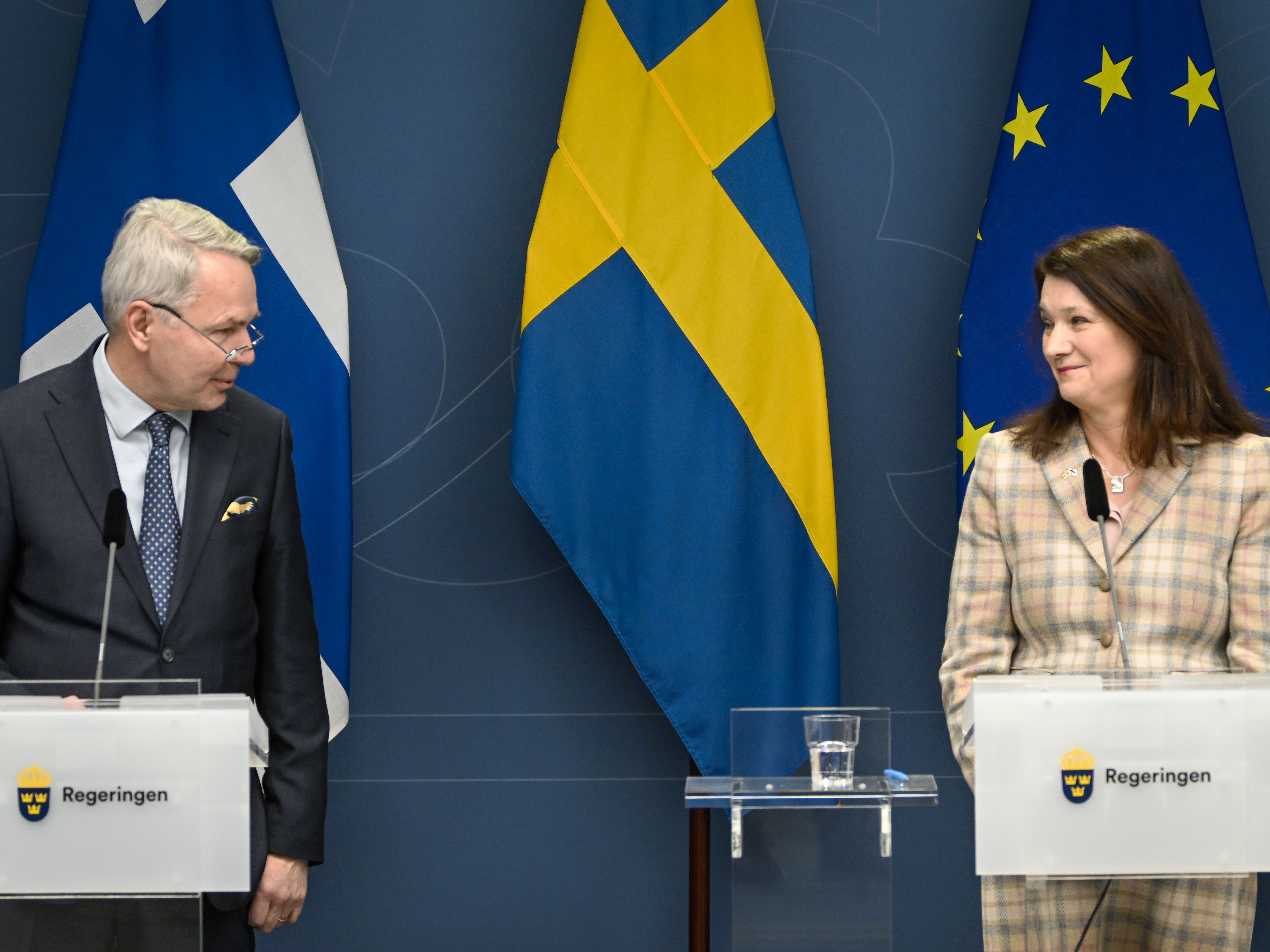 caption: Finnish Foreign Minister Pekka Haavisto, left, and his Swedish counterpart Ann Linde, take part in a joint news conference in Stockholm on Feb. 2, 2022, after talks on European security.