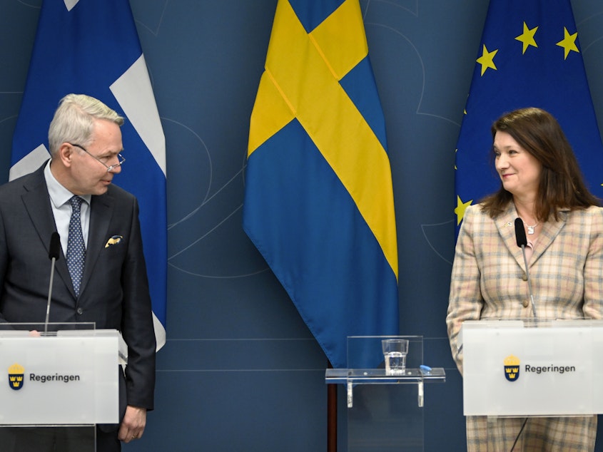 caption: Finnish Foreign Minister Pekka Haavisto, left, and his Swedish counterpart Ann Linde, take part in a joint news conference in Stockholm on Feb. 2, 2022, after talks on European security.