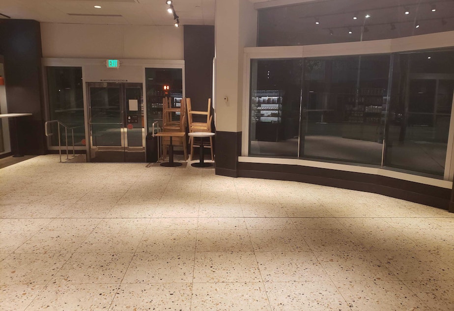 caption: The Starbucks at 2nd Avenue and Seneca Street, March 16, 2020. The first weekday after Gov. Jay Inslee ordered no public gatherings more than 50 people, and shut down restaurants and bars statewide. Starbucks also recently announced that it was halting in-person service and only doing to-go service.